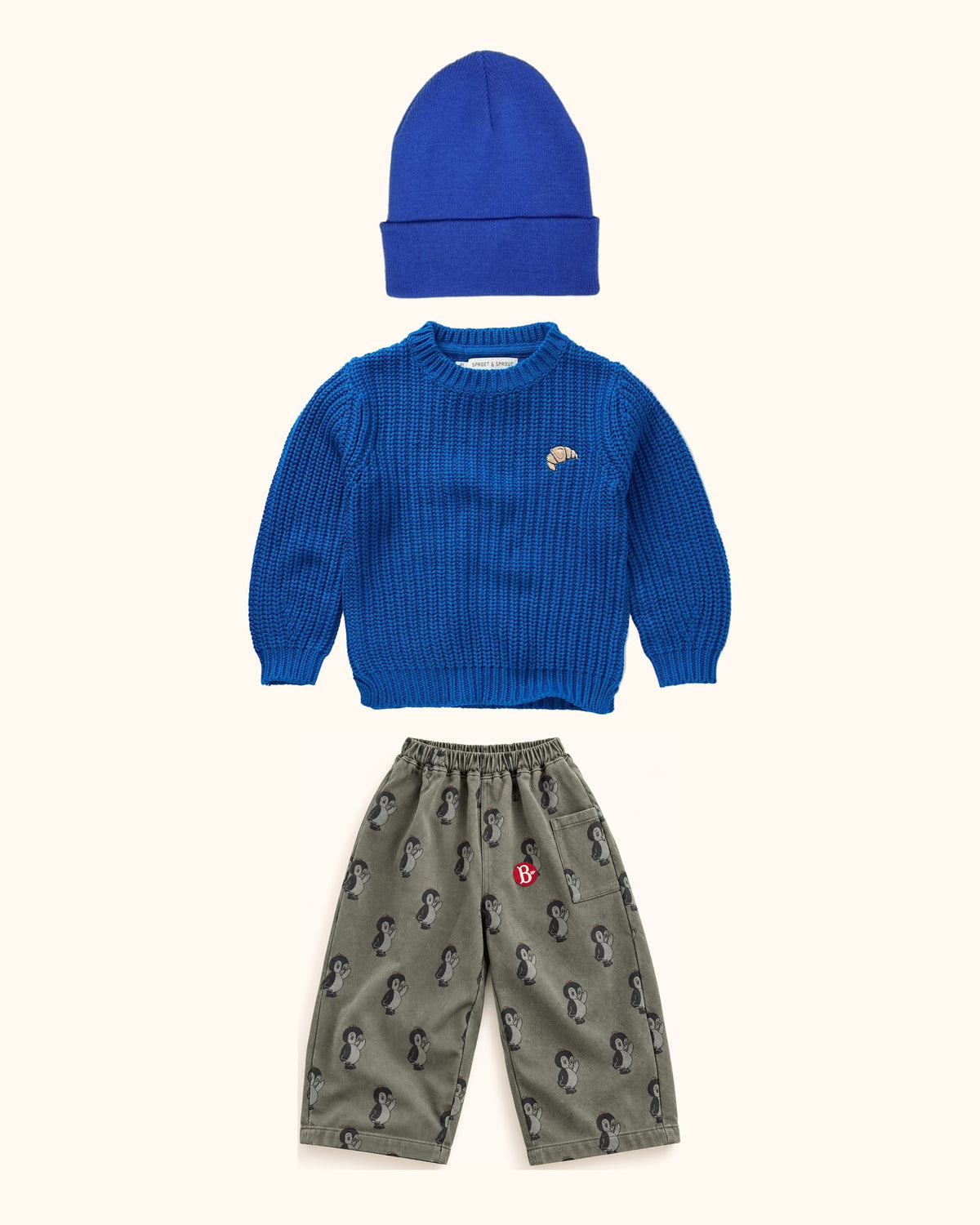 Blue Penguin Mini & Kids Look – originale Produkte auf einheitlichem Hintergrund