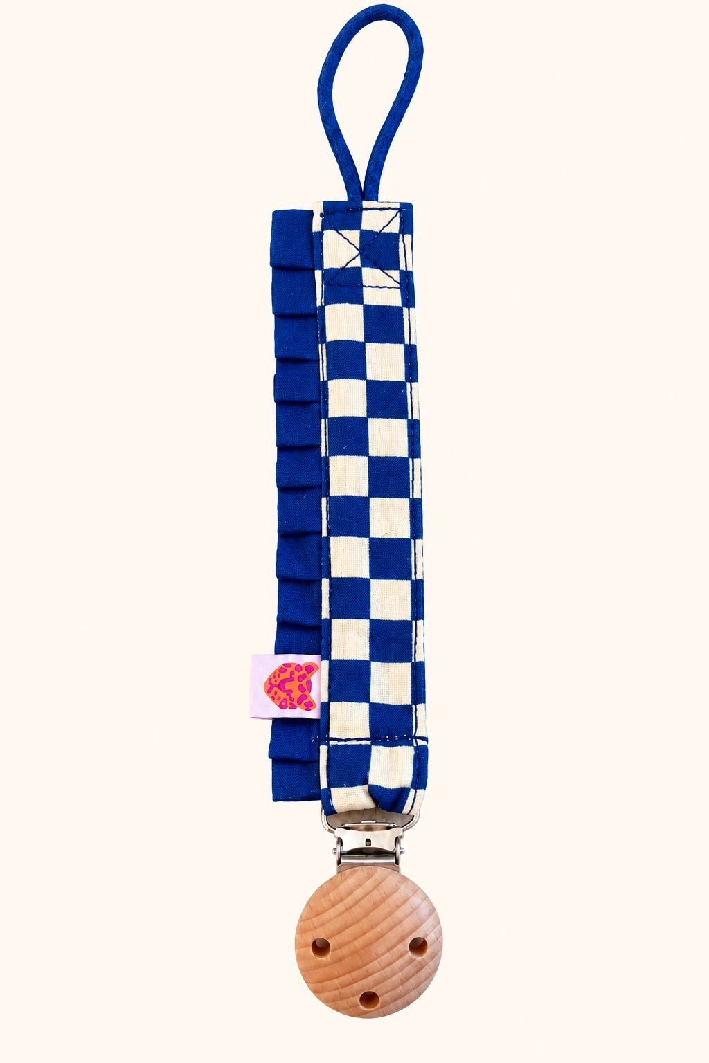 Blue Rock pacifier clip with ruffles by Colori Ribelle