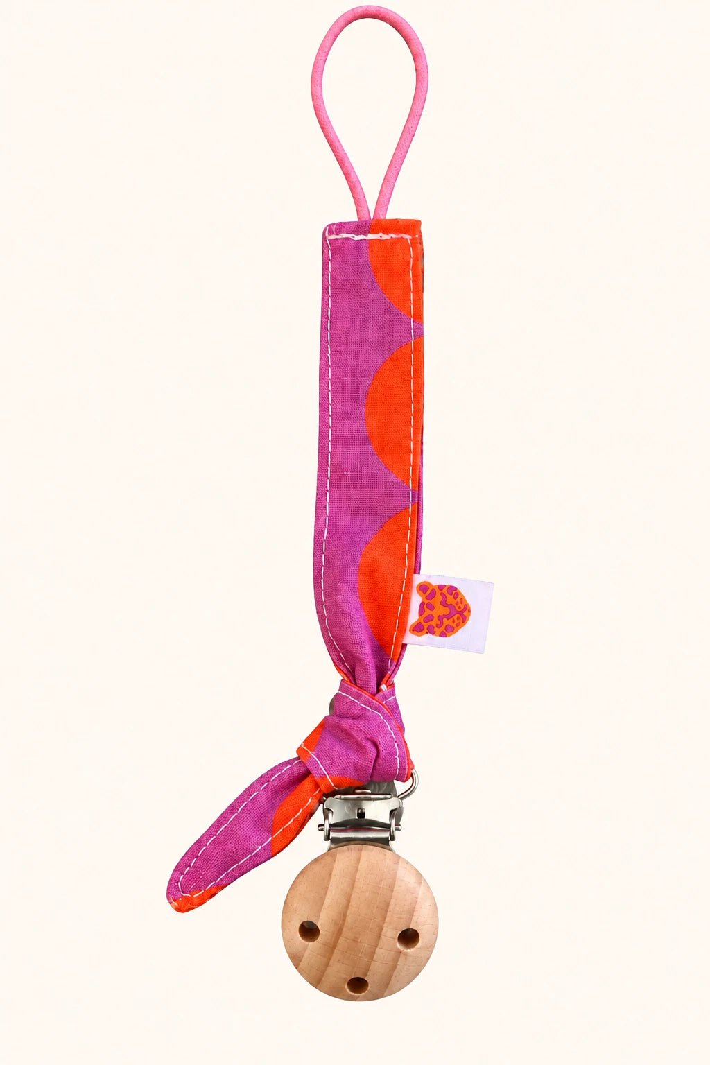 Rosa roter Schnullerhalter mit Knoten von Colori Ribelle