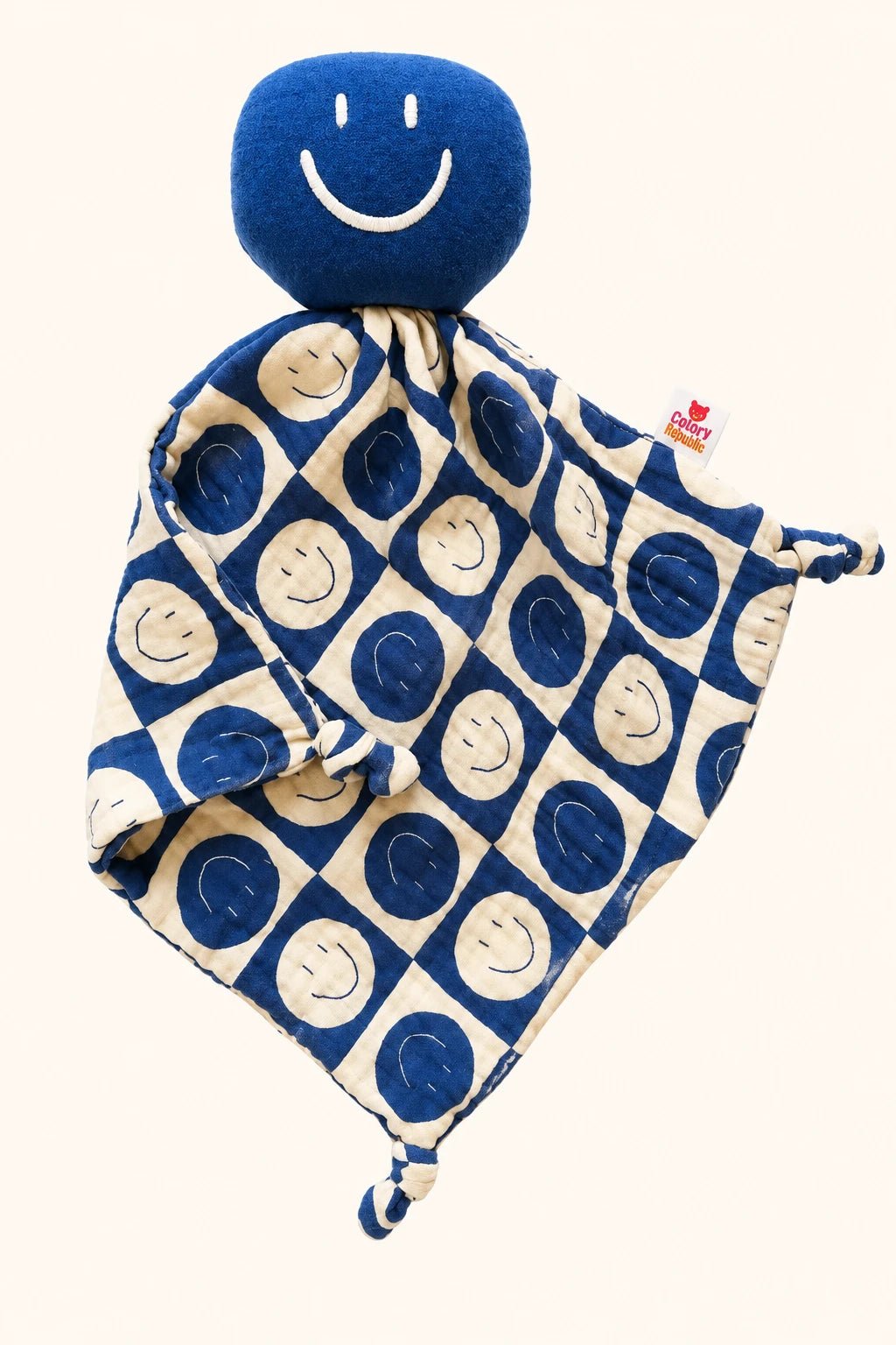 Blue smiley comfort blanket by Colori Ribelle