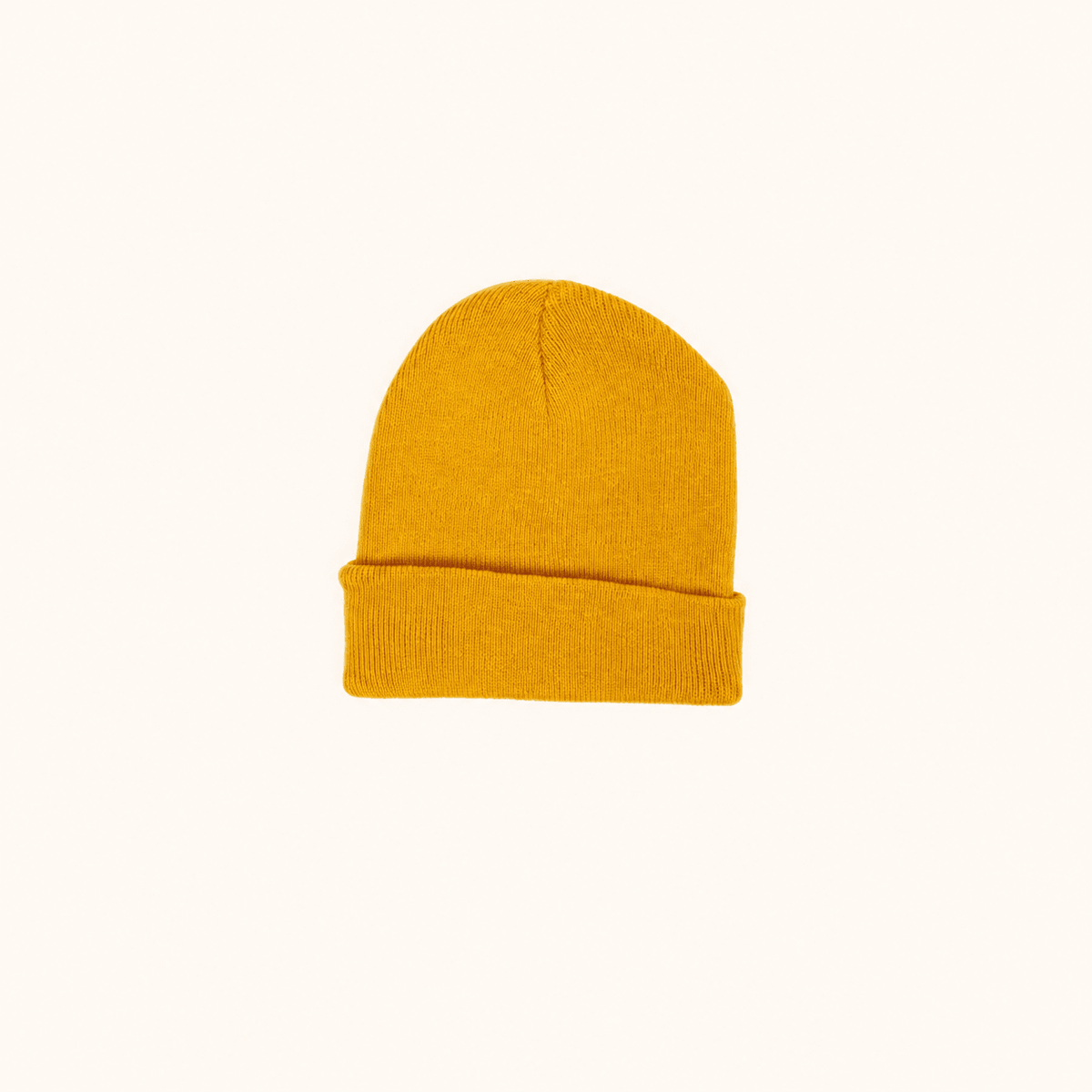 Colour Pop Beanie Mustard auf warmem beigem Hintergrund