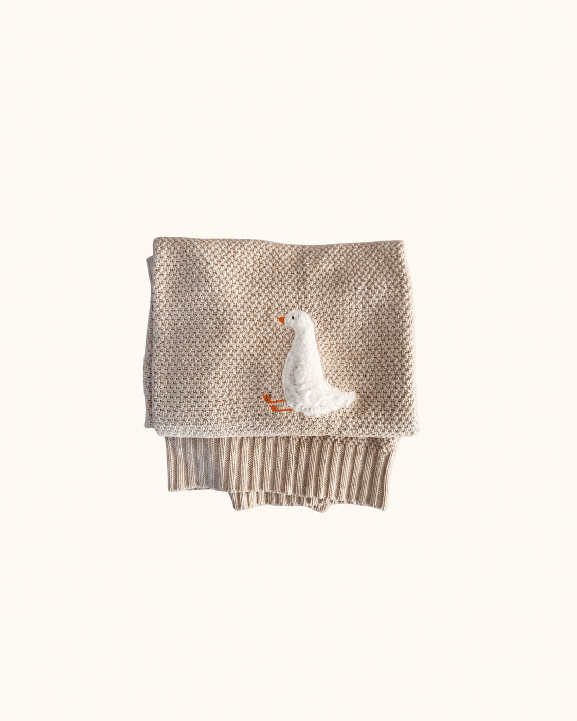 Beige Gordy Goose babydeken met witte gans van Lennyco