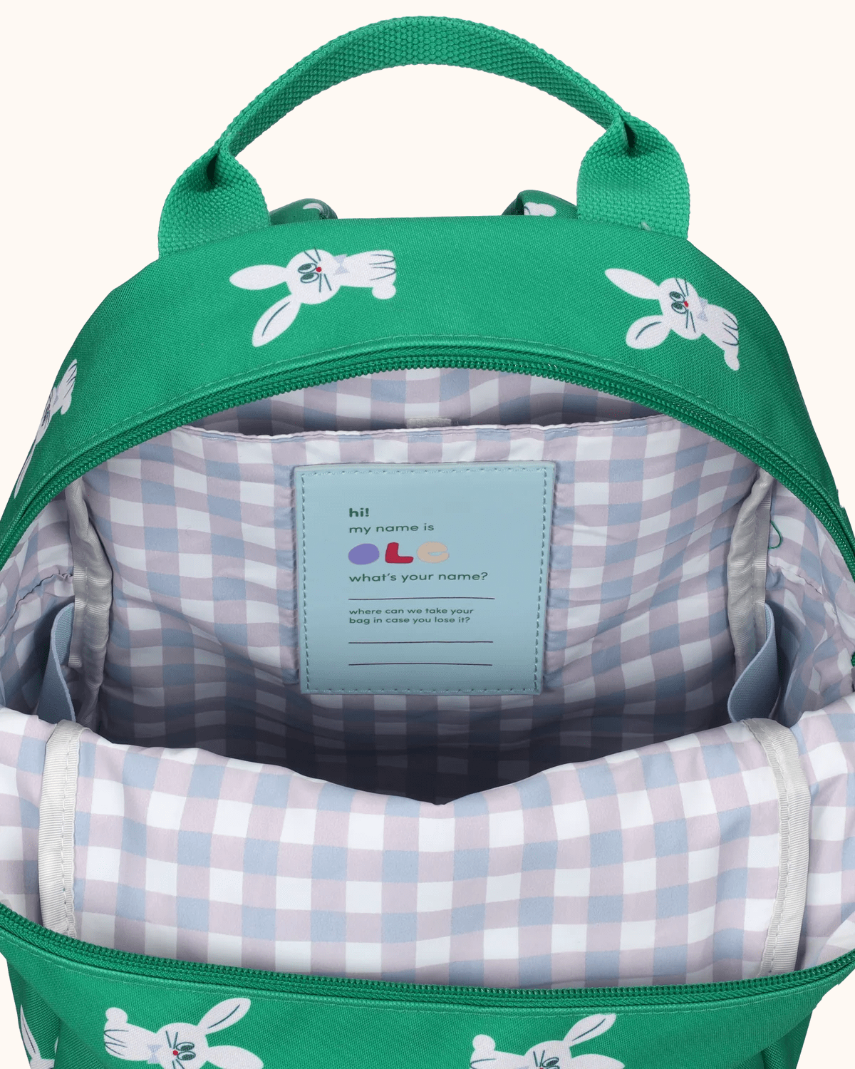 Backpack by Ole in green with rabbit motif, interior view