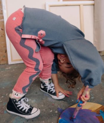 Leggings by Sproet & Sprout in pink and black, worn