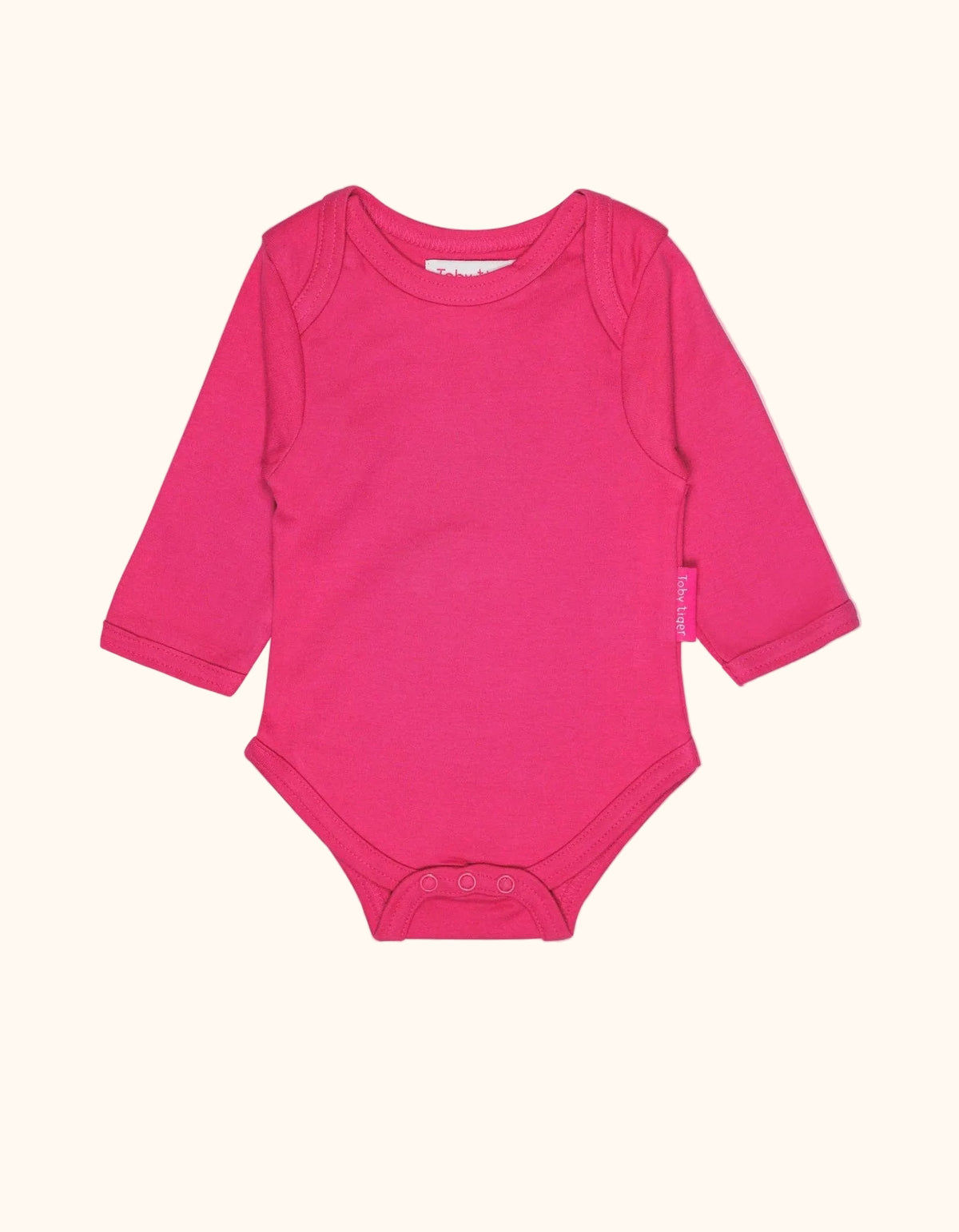 Babyromper van Toby Tiger in roze