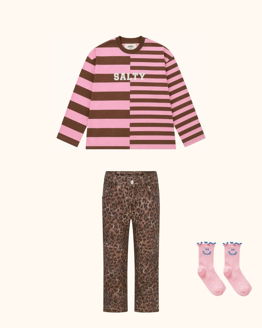 Pink Leo Kids Look – originale Produkte auf einheitlichem Hintergrund