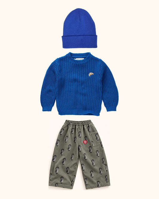 Blue Penguin Mini & Kids Look – originale Produkte auf einheitlichem Hintergrund