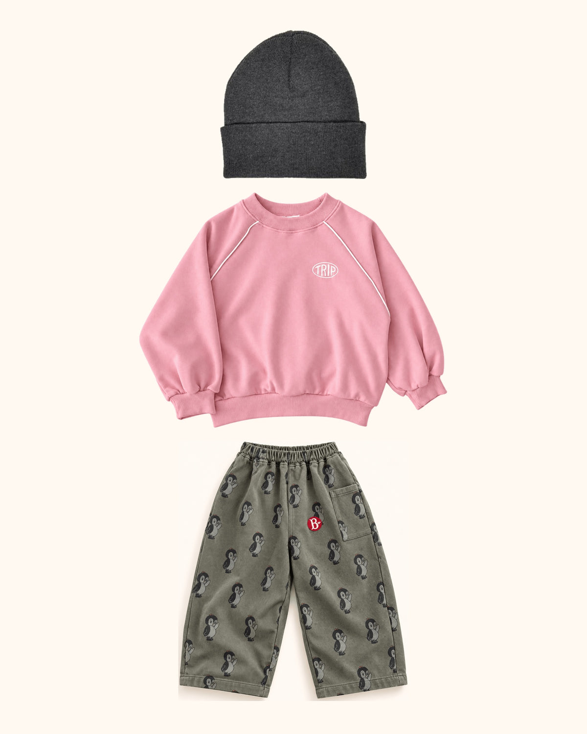 Pink Penguin Mini & Kids Look – originale Produkte auf einheitlichem Hintergrund