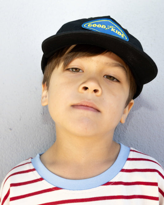 Child wearing black GOOD KIDS cap by Hello Harlow