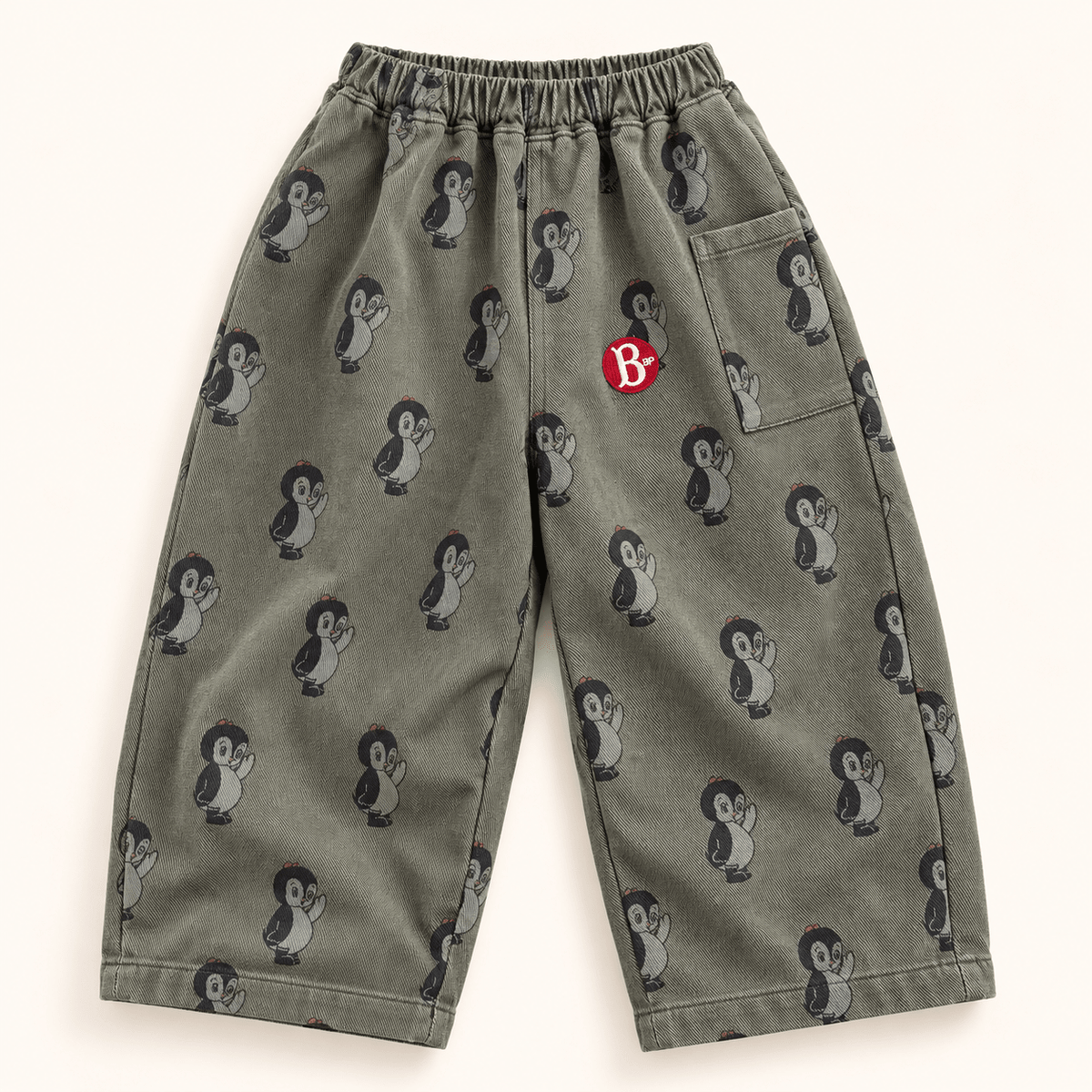 Graugrüne weite Kinderhose mit Pinguinprint