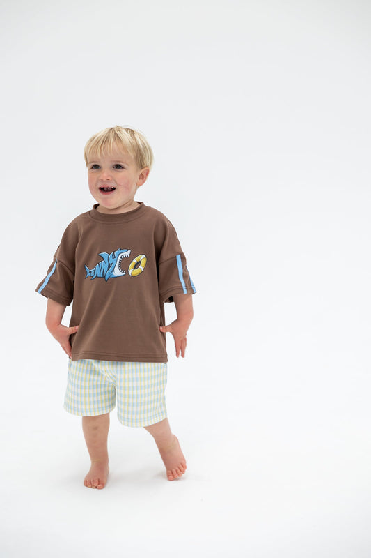 Child wearing a brown relaxed fit Shark T shirt by Lennyco