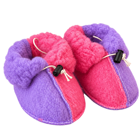 Wool baby booties by We Are Wovens in pink and purple